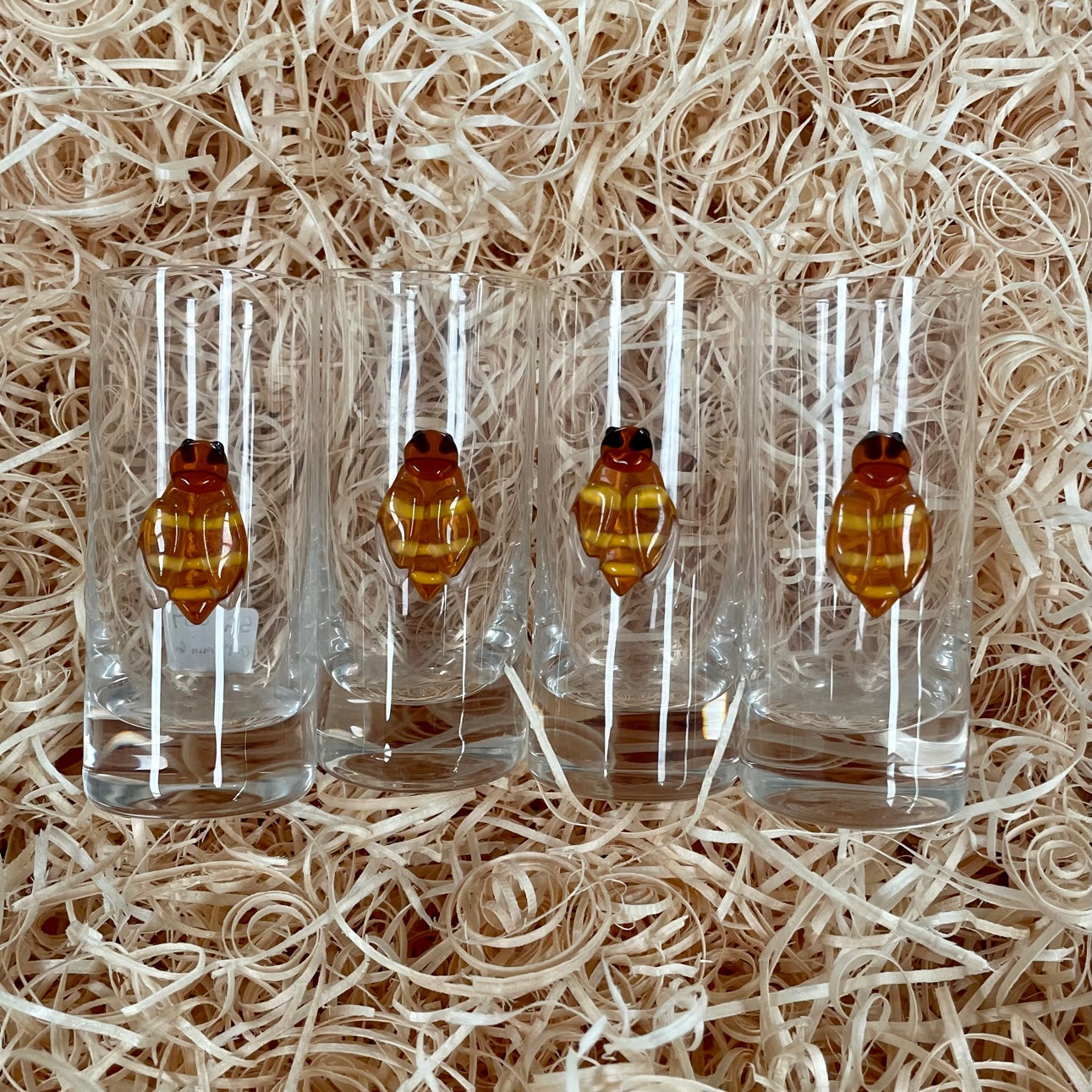A Set of 4 Bee Shot Glasses