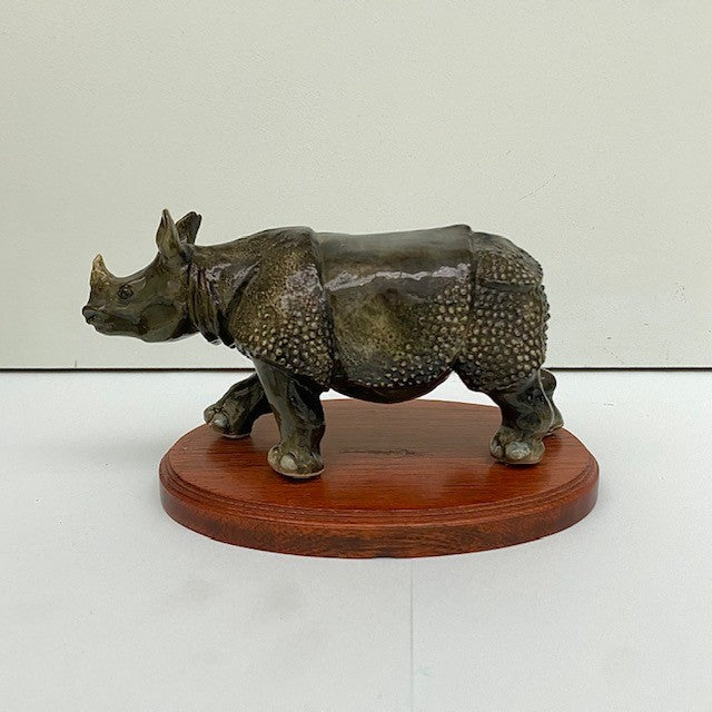Porcelain Rhino on Wooden Plinth